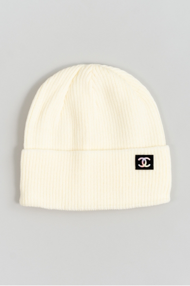 Шапка для дівчинки молочний в'язка