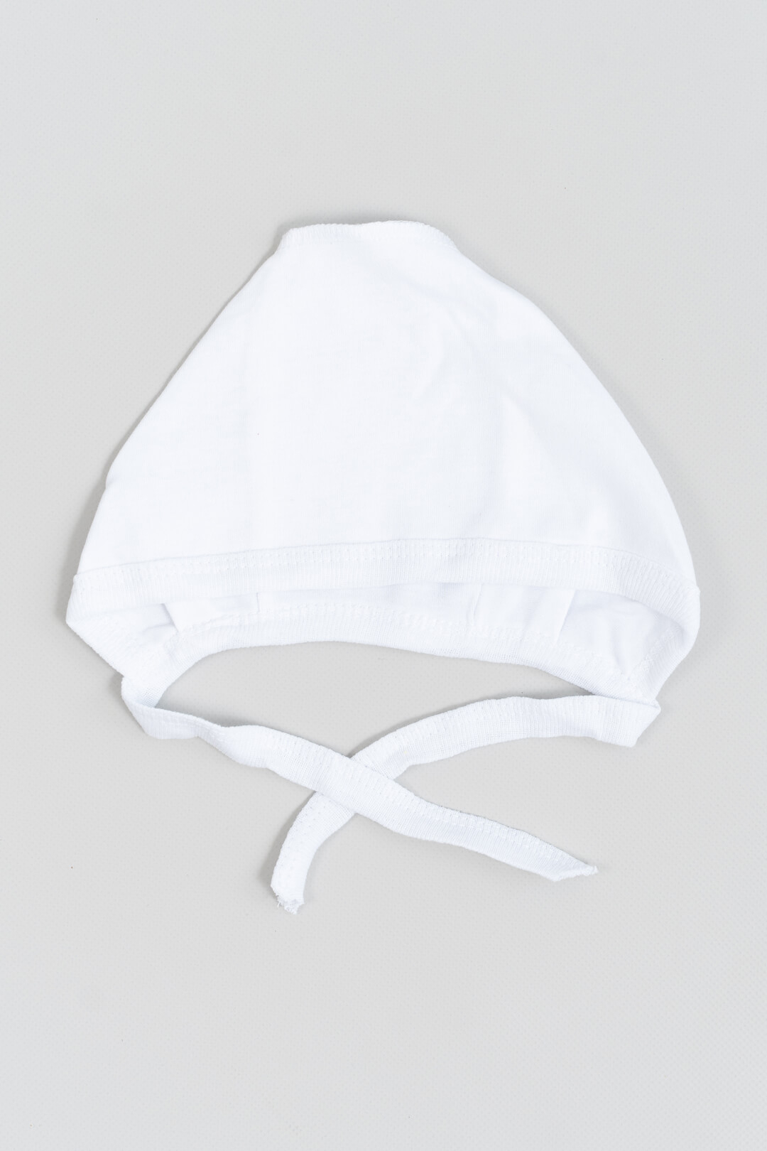 Шапочка ясельна для дівчинки білий інтерлок