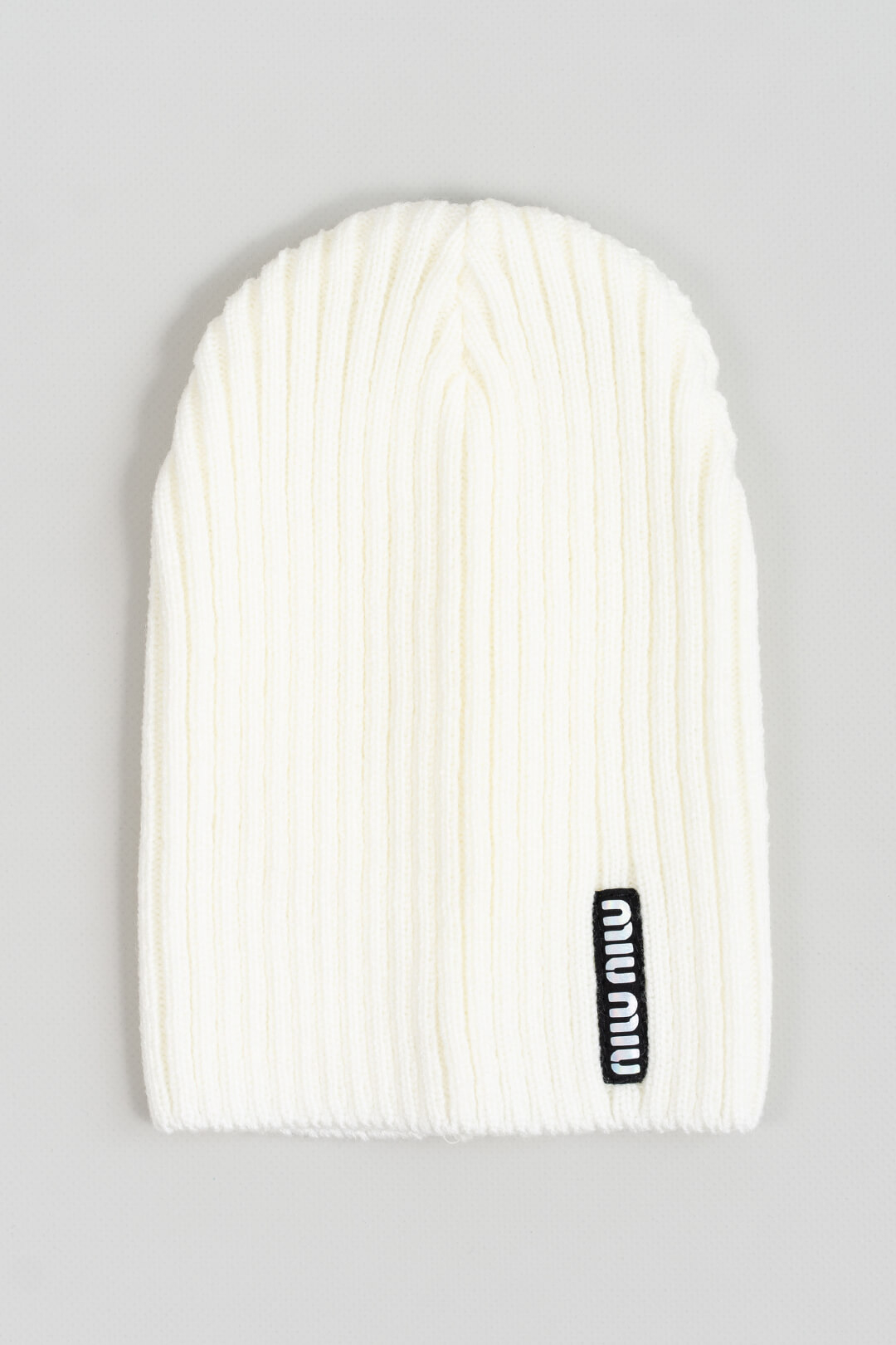 Шапка для дівчинки молочний в'язка