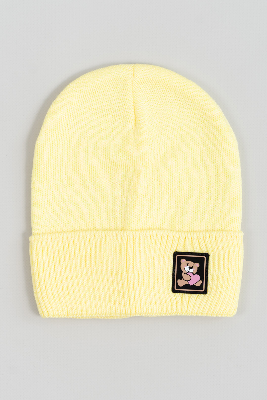 Шапка для дівчинки жовтий в'язка