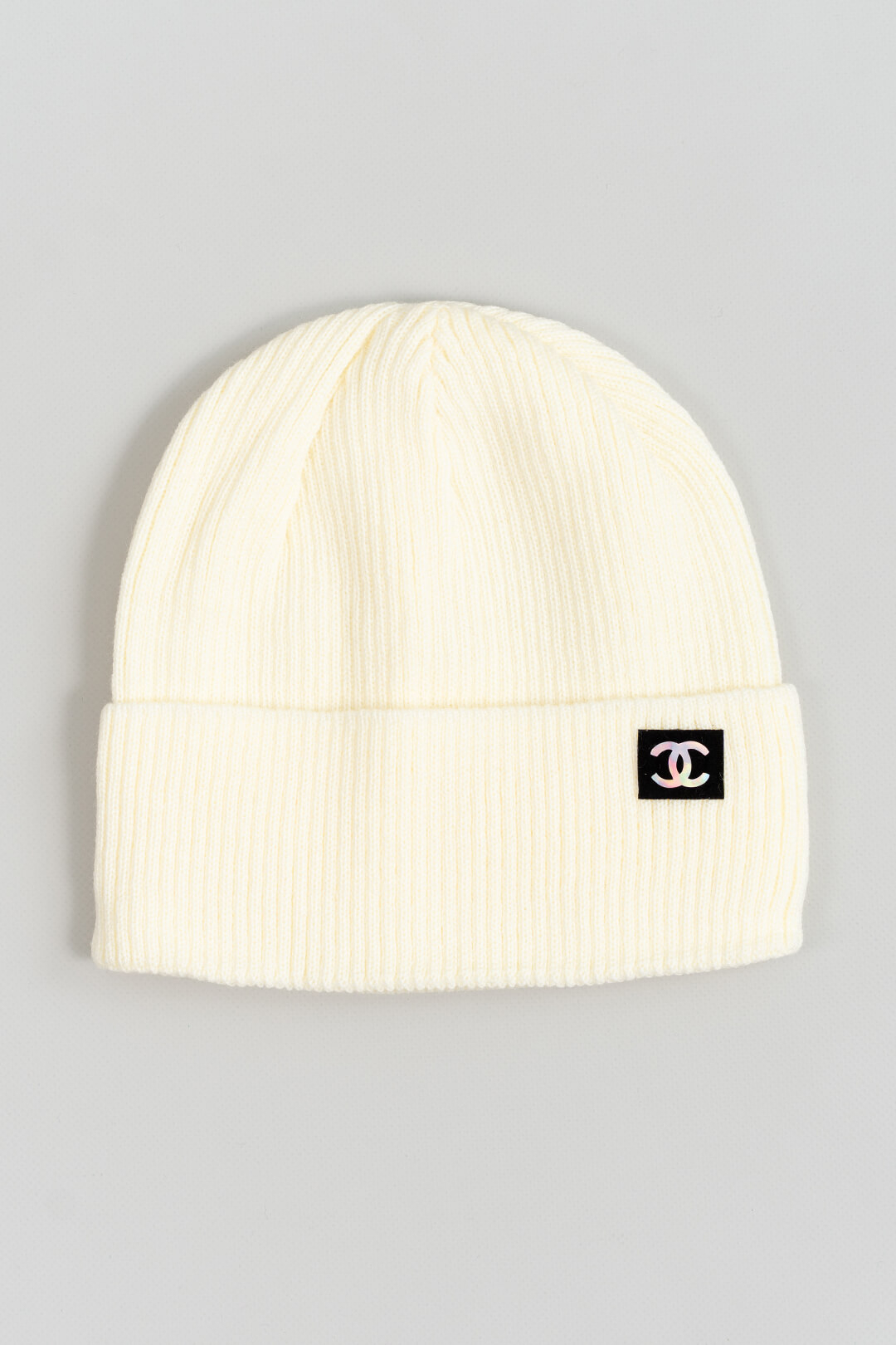 Шапка для дівчинки молочний в'язка