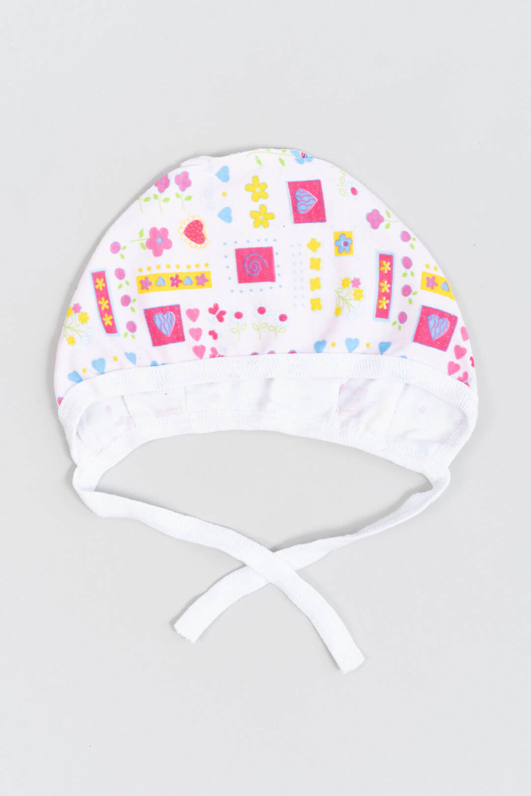 Шапочка ясельна для дівчинки Квіти рожевий інтерлок