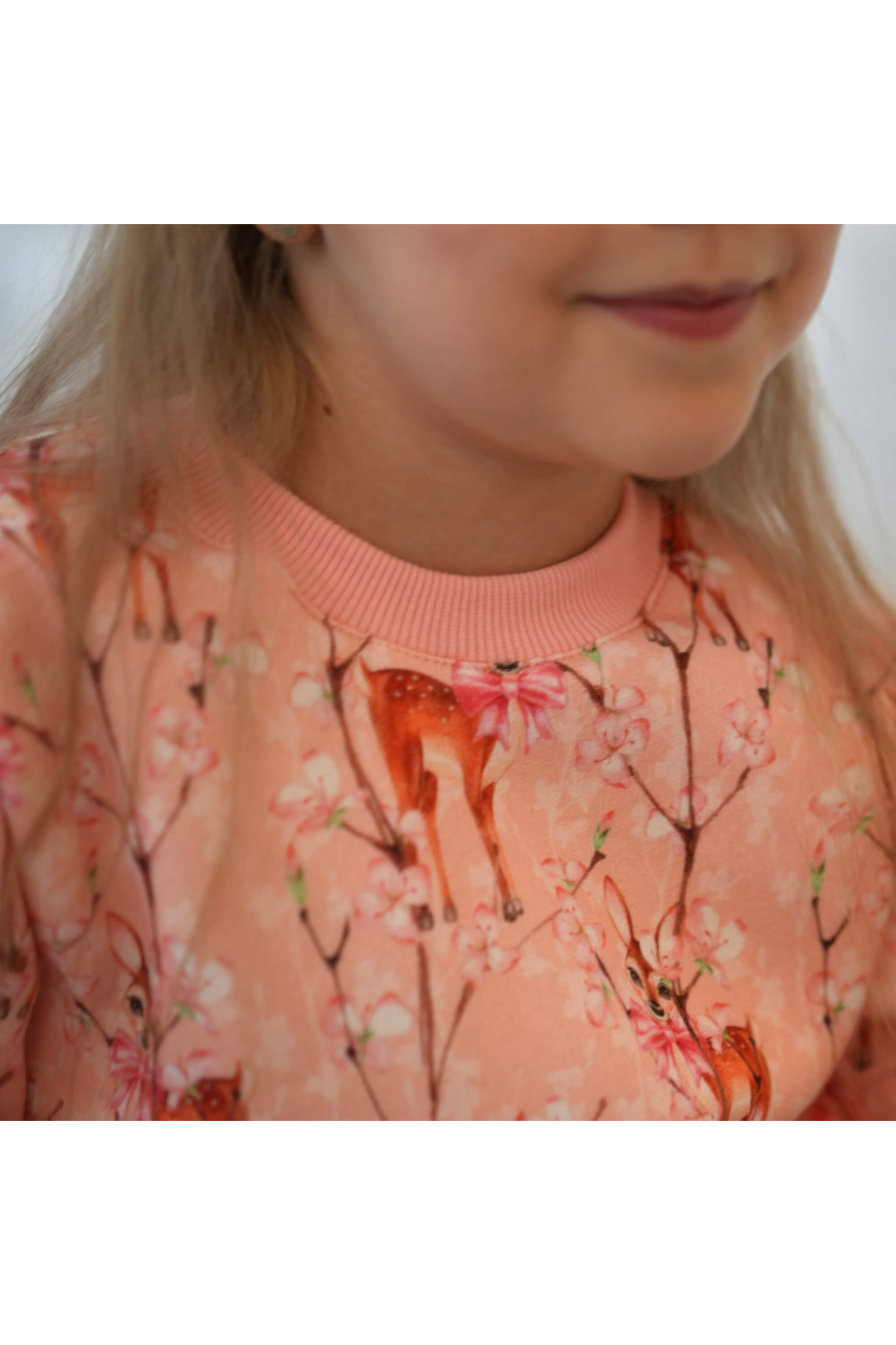 Джемпер теплий для дівчинки Оленята рожевий тринитка на флісі