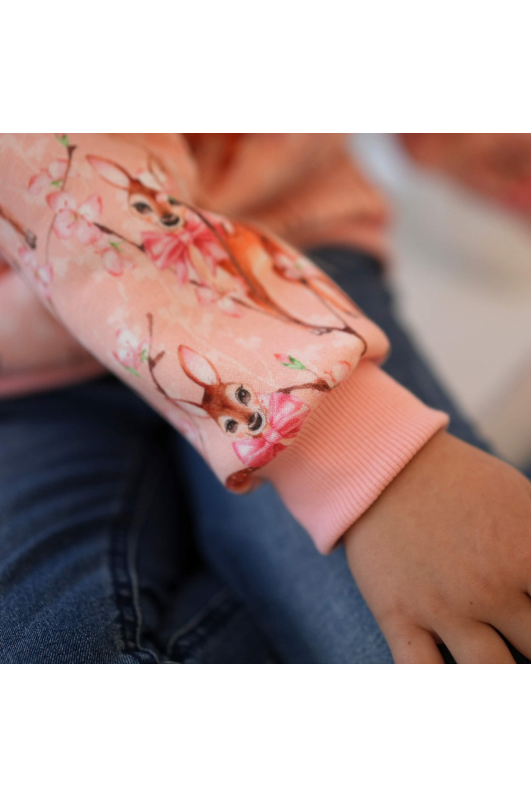 Джемпер теплий для дівчинки Оленята рожевий тринитка на флісі