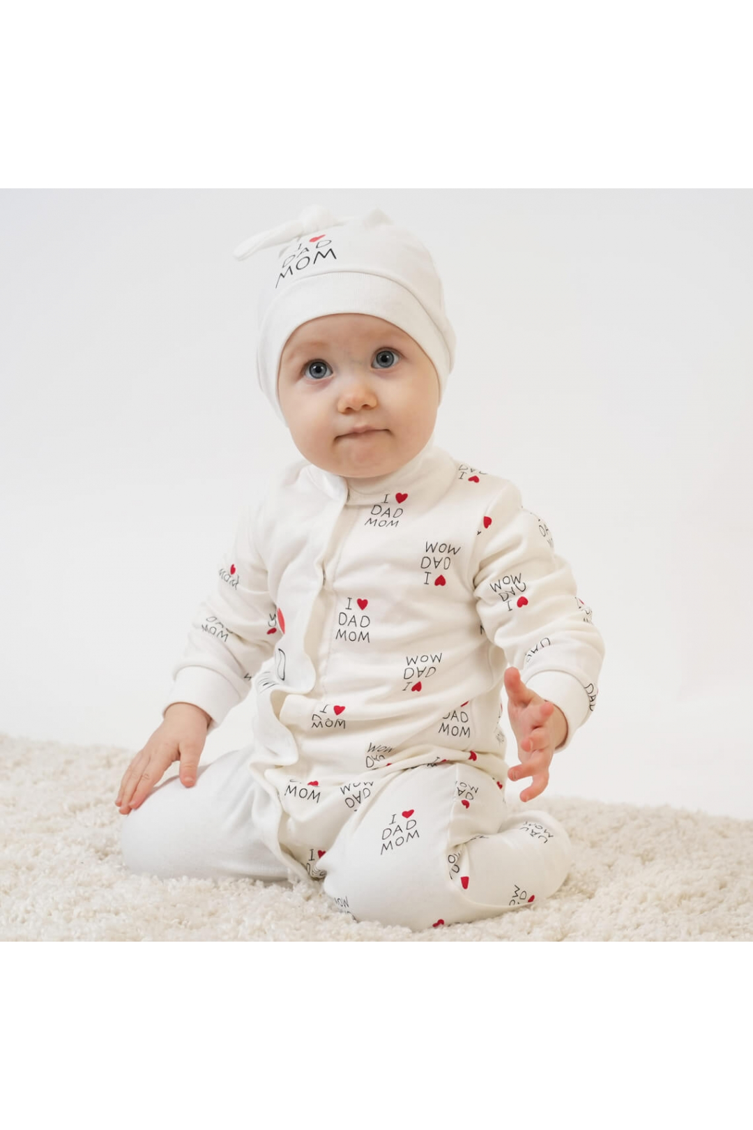 Чоловічок з шапочкою вузликом для малят молочний інтерлок