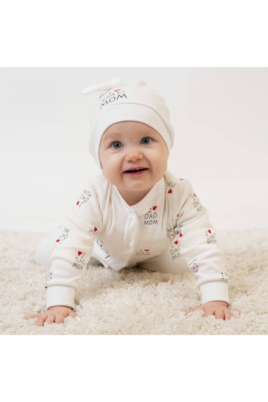 Чоловічок з шапочкою вузликом для малят молочний інтерлок