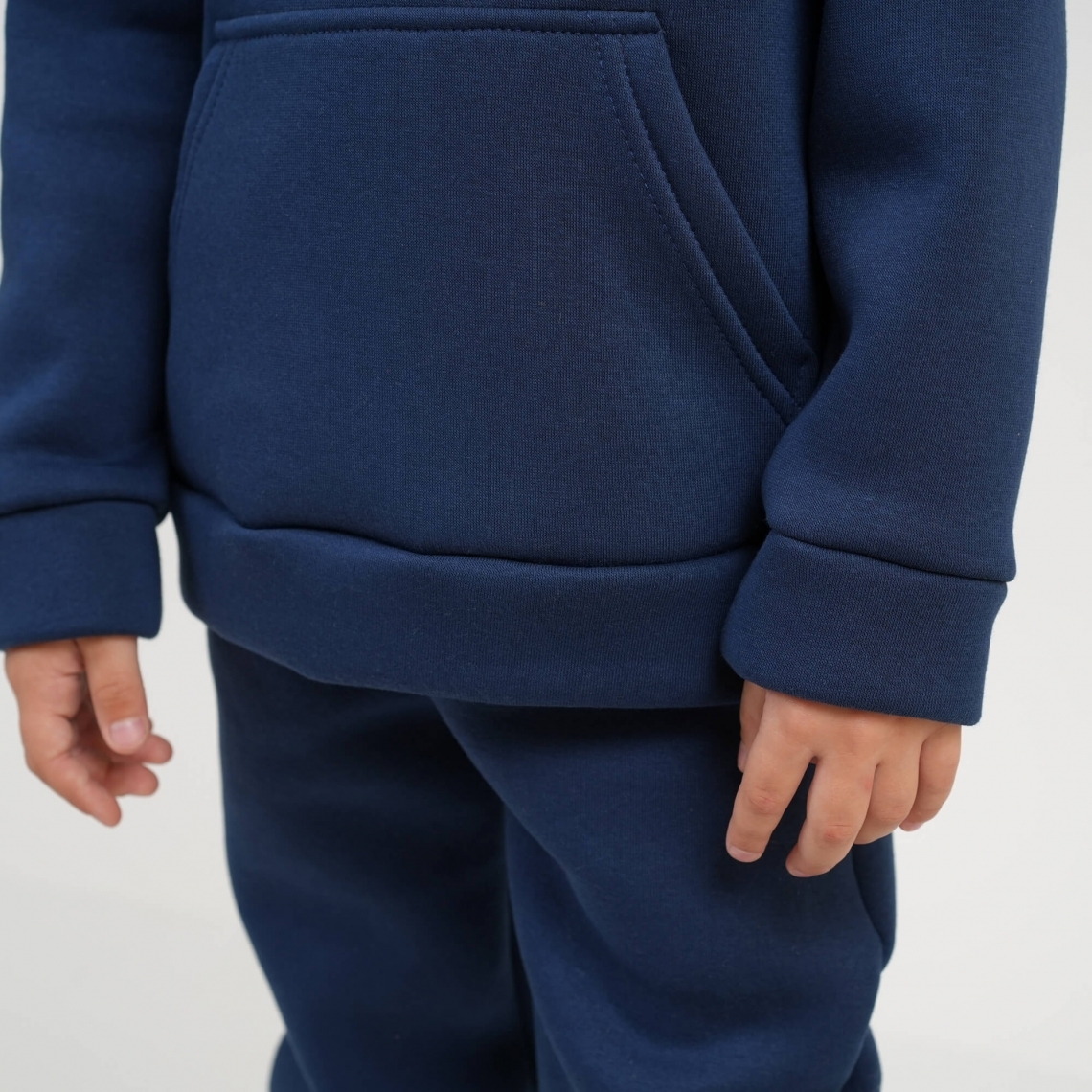 Теплий костюм для хлопчика темно-синій тринитка на флісі