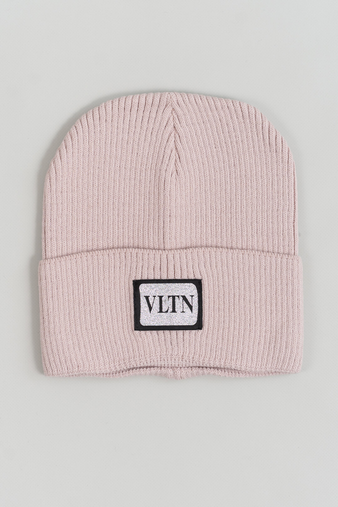Шапка для дівчинки пудрова в'язка