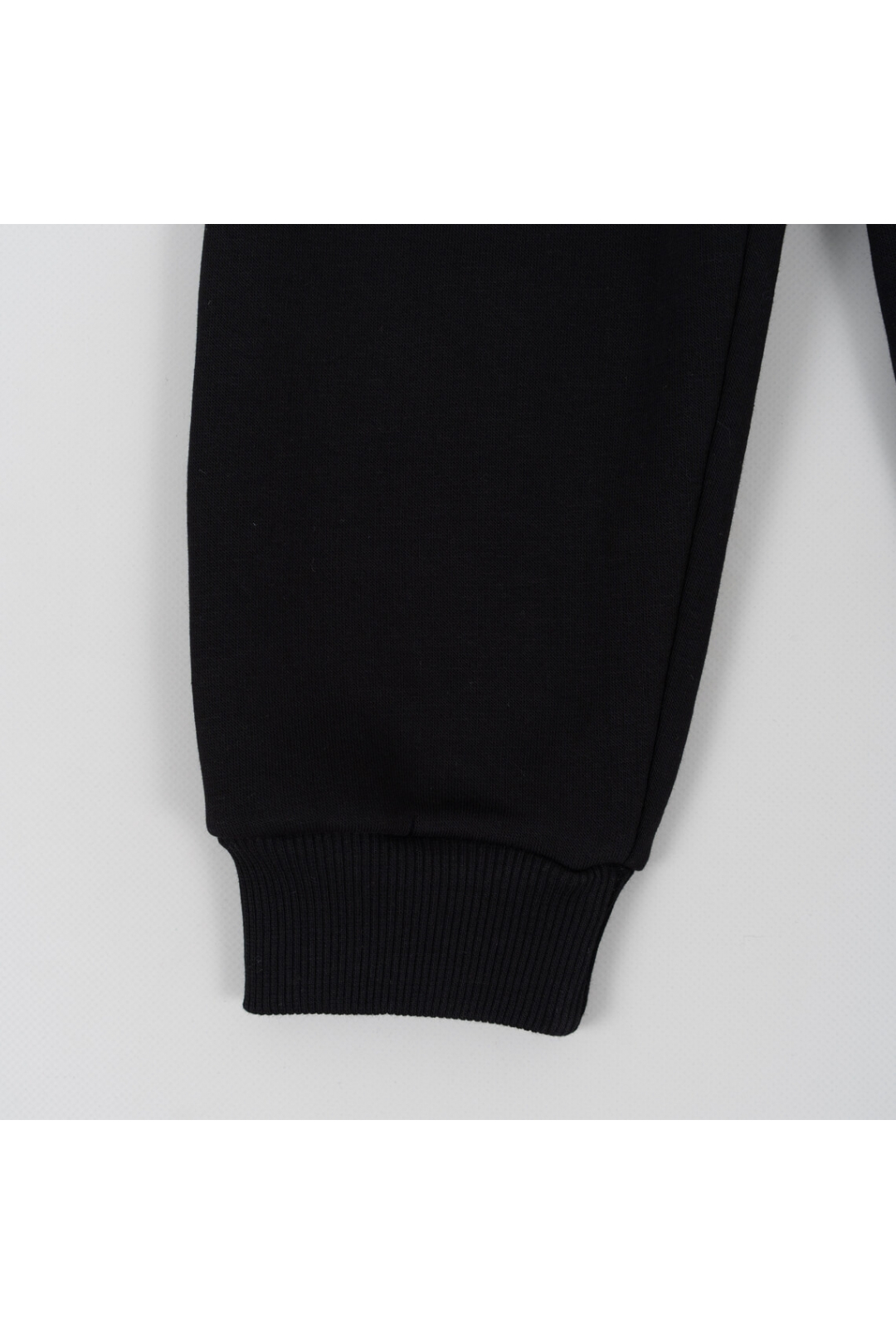 Теплі штанці для дівчинки чорний тринитка на флісі