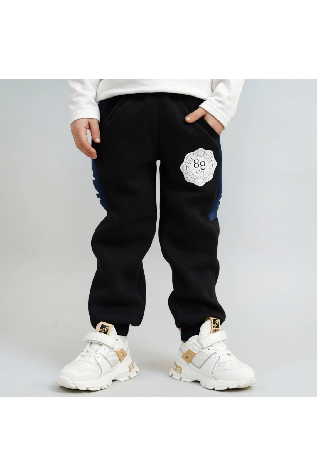 Штани для хлопчика чорний тринитка на флісі